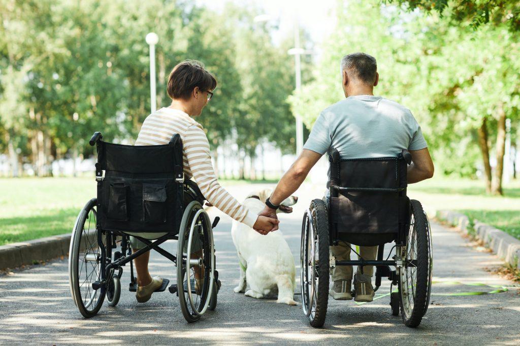 Couple in Wheelchairs in Park