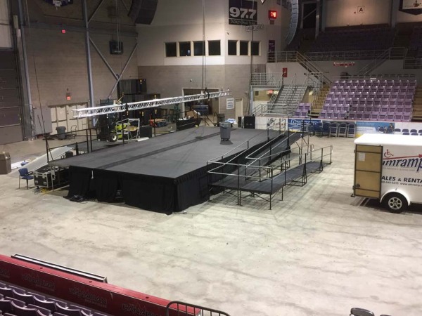 Stage and ramp set up at Grande Prairie Alberta High School Graduation with Amramp truck in the picture
