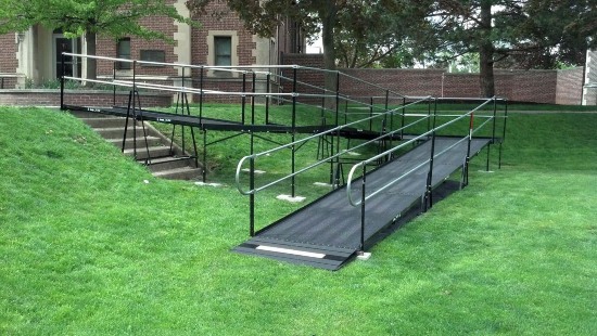 Ramp outside on a green lawn leading to a sidewalk at Hobart William Smith Colleges