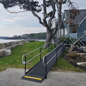 a steel modular wheelchair ramp supporting access to a home