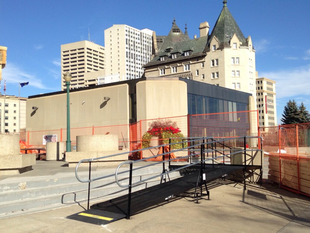 Temporary Amramp modular access ramp installed at a construction site in Edmonton.